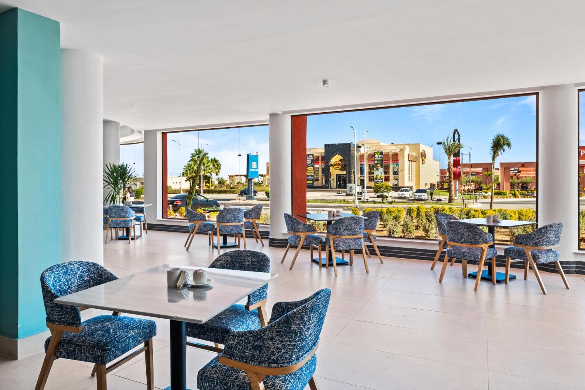 Pickalbatros Laguna Club Resort Sharm El Sheikh Extérieur photo The restaurant at the hotel